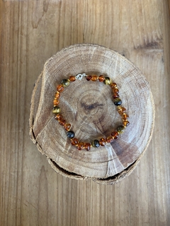 Pulseira Âmbar + Olho de tigre na internet