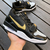 Air Jordan Legacy 312 Low Black Yellow na internet