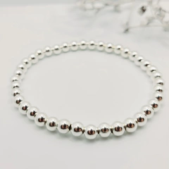 Pulseira Bolas 5mm Silicone Prata 925 na internet