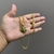 Corrente 60cm Groumet duplo 5mm + Pingente Trevo - Banhado a Ouro 18K na internet