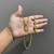 Corrente 60cm Groumet dupla 5mm + pingente Nossa Senhora Aparecida - Banhada a Ouro 18K - comprar online
