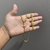 Corrente 60cm Groumet duplo 5mm + Pingente Cruz Palito - Banhado a Ouro 18K na internet