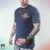 Remera God Of War Be A Warrior Gris Oscuro (PlayStation Studios)