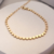 Pulseira bolinhas achatadas