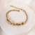 Pulseira esferas