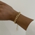 PULSEIRA GRUMET G REGULAVEL DOURADO na internet