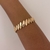 PULSEIRA ELOS CHAPAS OVAIS DOURADO na internet