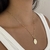 COLAR SÃO MIGUEL ARCANJO DOURADO na internet