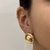 BRINCO DESIGN FLOR DOURADO na internet