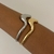 Imagem do BRACELETE ORGÂNICO V FECHO CLICK DOURADO