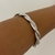 BRACELETE TORCIDO LISO RÓDIO BRANCO - Olimavie Semijoias