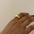 Imagem do ANEL VOLTAS LADO GROSSO DOURADO - AJUSTÁVEL