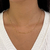 COLAR CHOKER CORRENTE COM BOLINHAS DOURADO - comprar online