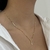 COLAR CORAÇÃO LISO VAZADO COM MENINO CRAVEJADO DOURADO - Olimavie Semijoias