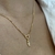 COLAR CORAÇÃO LISO VAZADO COM MENINO CRAVEJADO DOURADO na internet