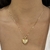 COLAR RELICÁRIO CORAÇÃO COM MENINA CRAVEJADO DOURADO - comprar online