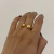 ANEL DUAS PONTAS DOURADO - AJUSTÁVEL - comprar online
