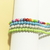Conjunto com 4 Pulseiras de Bolinhas - Azul, Cinza e Verde - comprar online