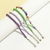 Conjunto com 4 Pulseiras de Bolinhas - Verde, Lilás e Roxo