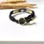 Pulseira Chan Luu Preta com Branco, Amarelo e Cinza na internet