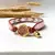 Pulseira Chan Luu Rosa com Cinza Branco e Verde na internet