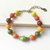 Pulseira de Bolas Coloridas de Resina