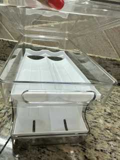 Hueva deslizante grande con tapa, ideal para almacenar huevos en la cocina.