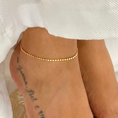 Tornozeleira Mini Bolinhas Achatadinhas Banhado a Ouro 18k