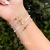 Pulsera chaquira estrella y flor - comprar en línea