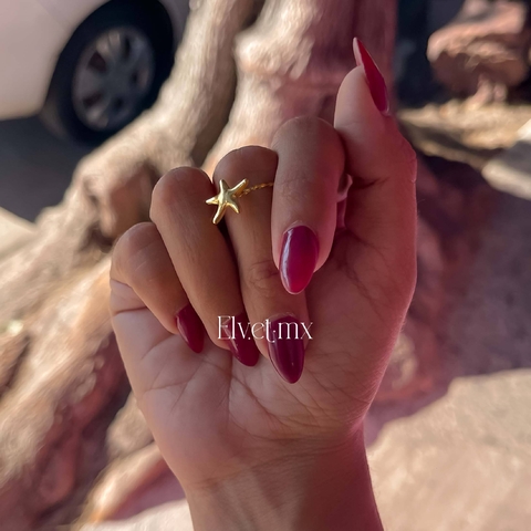 Anillo estrella de mar acero