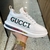 Tênis da Gucci