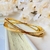 Bracelete Verniz X Dourado