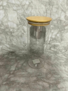 Frascos organizadores redondos de vidrio con tapa de bambú. - comprar online