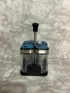 Especiero x4 con Soporte – Frascos de Vidrio con Tapas de Acero y Plástico. COD: 1644.