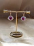 Aretes de ojos dorado