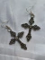 Aretes de cruz grunge en internet