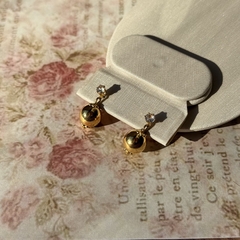 BRINCO ESFERA COM ZIRCONIA (OURO) - Nova Topázio