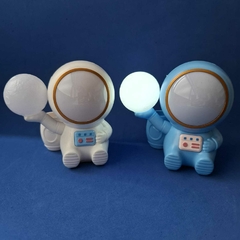Luminária + Apontador Astronauta na internet
