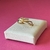 The Graces - Anel em Ouro Amarelo 18k com fios entrelaçados decorado por diamantes.