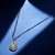 Colar com safiras naturais, fecho em ouro 18k e pingente esmaltado com passador em ouro 18k. na internet