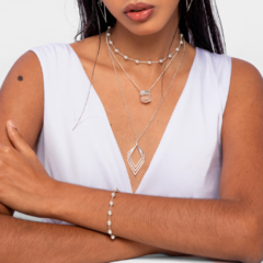 Pulseira em bolas e pingente de coração