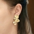 Brinco Meia Flor Grande Banho Ouro 18k - comprar online