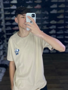 Camiseta Nike Ovo Marrom M189 na internet