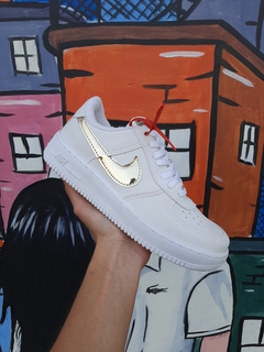 Tênis Nike Branco com Dourado Primeira linha T350