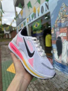 Tenis de corrida NIKE T406
