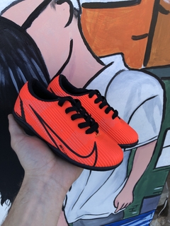 Chuteira Infantil NIKE Laranja T388 na internet