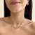 CHOKER OLHO GREGO