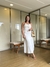Vestido longo com flor alto Relevo Linho Misto - comprar online