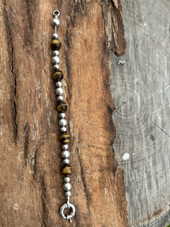 Antigua pulsera de plata y ojo de tigre en internet