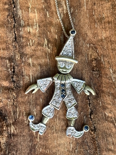 Antiguo arlequín articulado de plata bañado en oro con circonios y zafiros reconstituidos. - comprar online